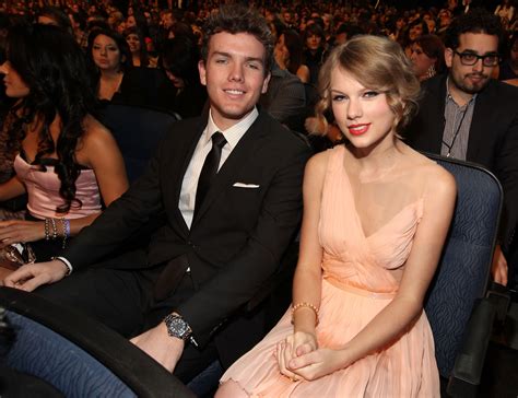is austin swift younger than taylor swift