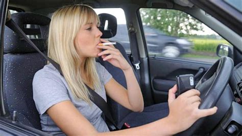 is it illegal to smoke while driving