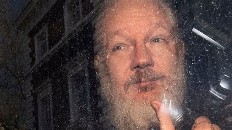 is julian assange in prison