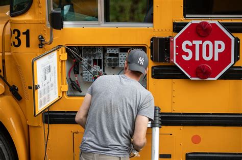 is passing a school bus a moving violation