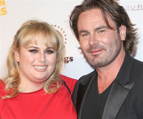 is rebel wilson engaged to mickey gooch