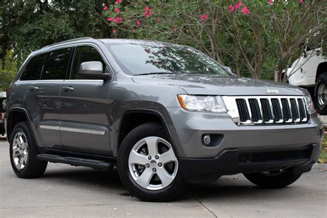 is used 2011 jeep grand cherokee a good car