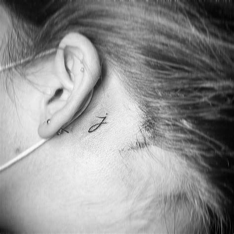 J Tattoos Behind Ear