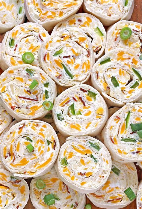 Jalapeno Cheddar Roll Ups Can't Stay Out of the Kitchen