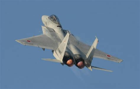 japan scrambles jets to escort us aircraft