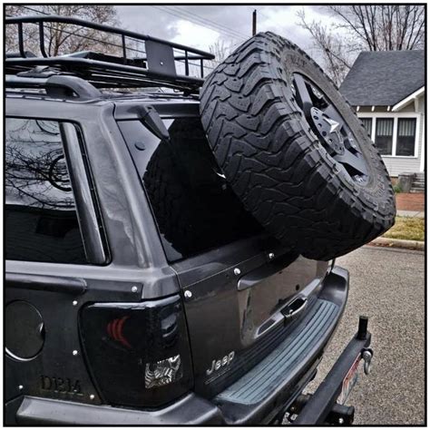 jeep cherokee spare tire mount roof