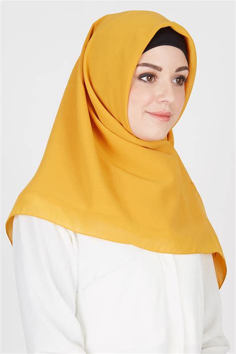 Gambar jilbab kuning mustard