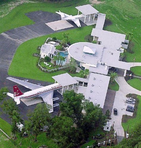 john travolta's florida house with airplane