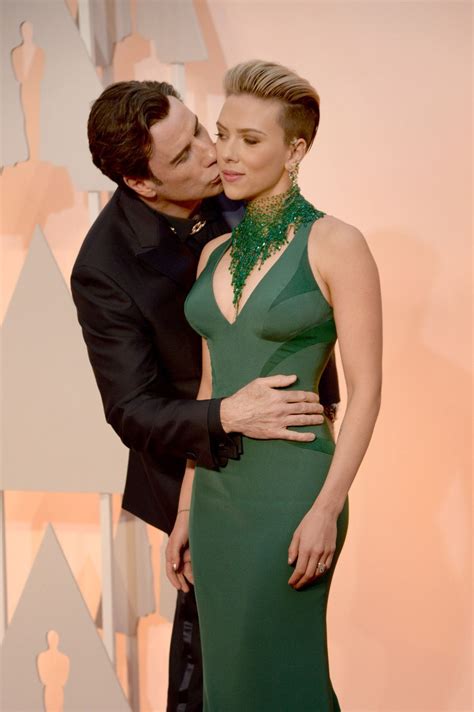 john travolta kissing guy at oscars