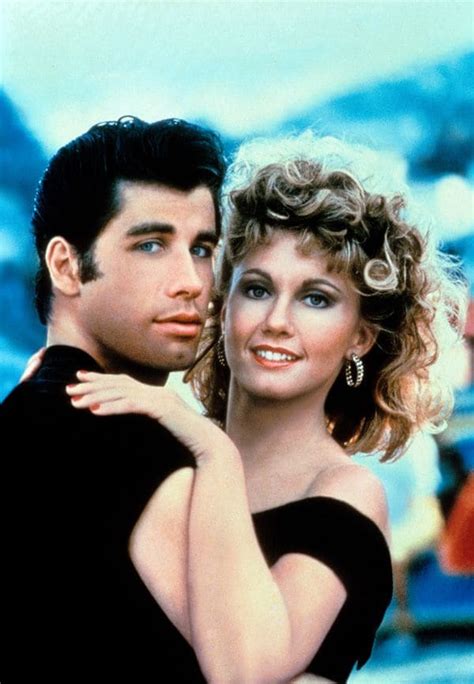 john travolta name in grease