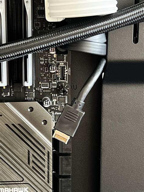 Do I need the JUSB4 header on my motherboard, or can I leave it