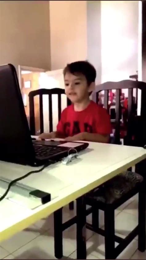 Kid With Glasses On Computer Meme