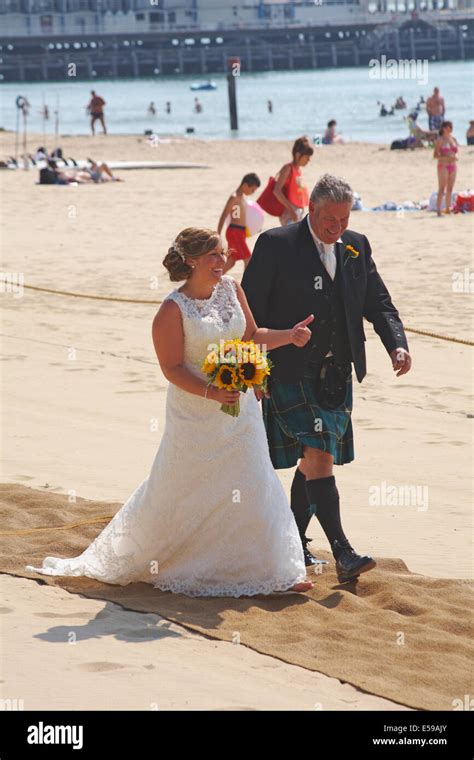 A Rustic Scottish Beach Wedding With Bride In Justin Alexander And