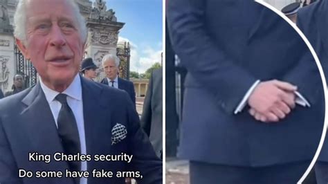 king charles bodyguards fake hands