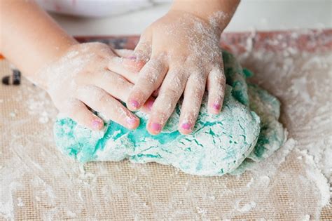 Knead the playdough before playing