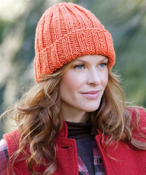 Ladies Hat With Stripes And PomPom Knitting Pattern The