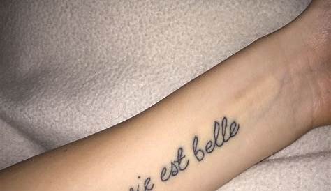 "La vie est belle." | 44 Beautiful and Inspiring Quote Tattoos