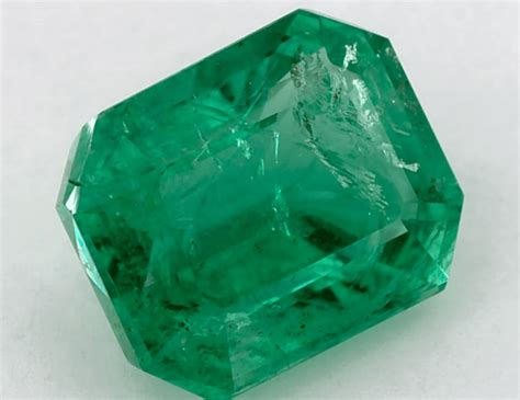 Lab Created Emerald With Inclusions