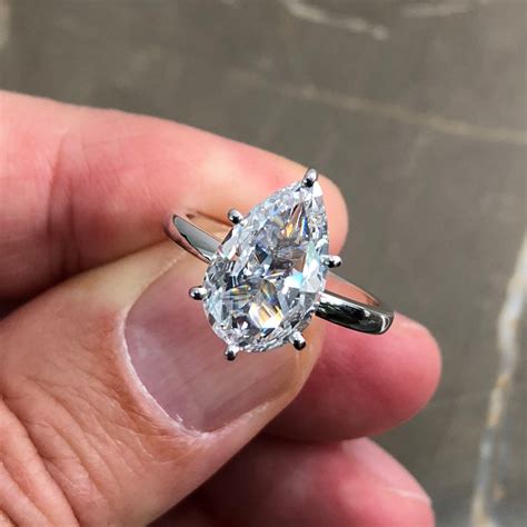 lab diamond pear engagement rings