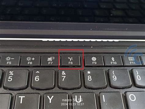 laptop and wifi button