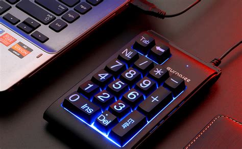 laptop with backlit keyboard and number pad