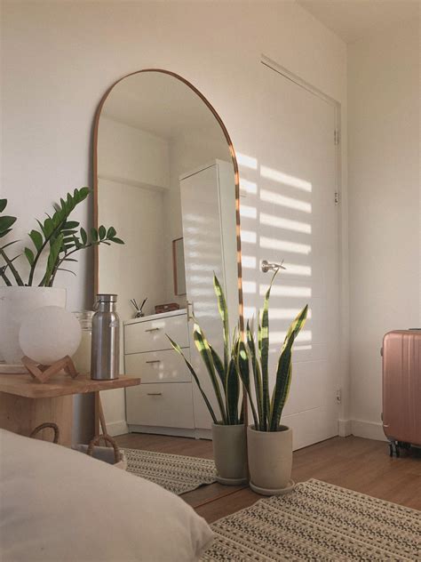 Image of a Bedroom with a Large Mirror