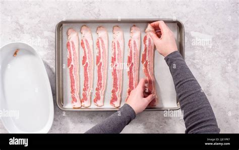 Lay bacon slices on a baking sheet