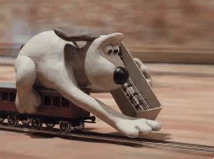 laying tracks in front of train gif