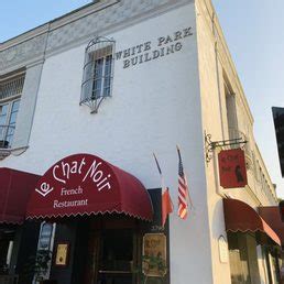 Unveil the Secrets of Le Chat Noir's Riverside Haven: A Gourmet Experience