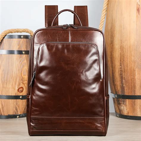 Leather backpack laptop bag spacious interior
