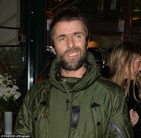 liam gallagher teeth knocked out