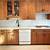 light wood cabinets with subway tile