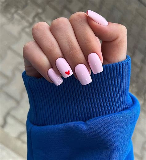 Valentine's nails pink, hearts, polka dots, and glitter. Valentine