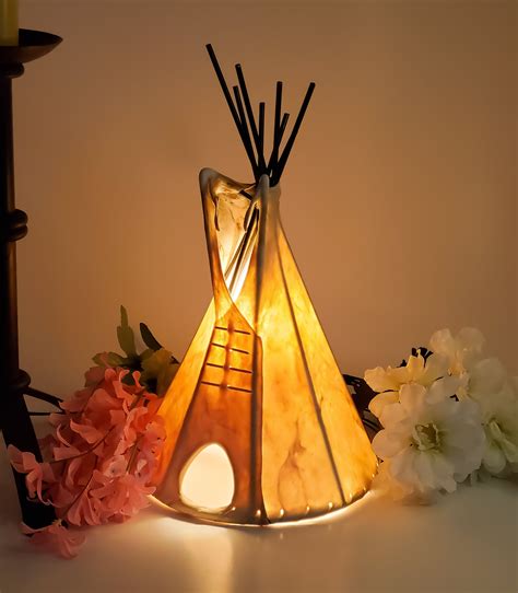 lighted teepee decoratation in black and white ceramic