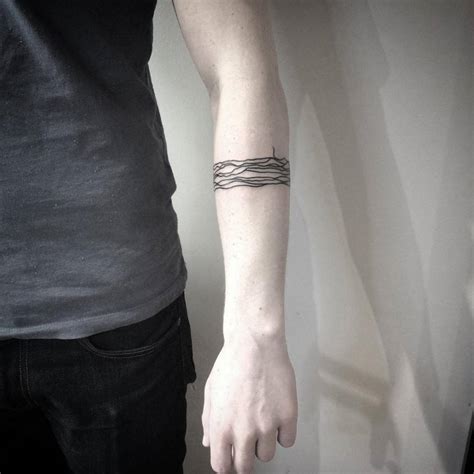 Powerful Line Arm Tattoo Designs 2023