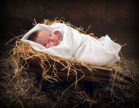 little baby jesus lying in a manger