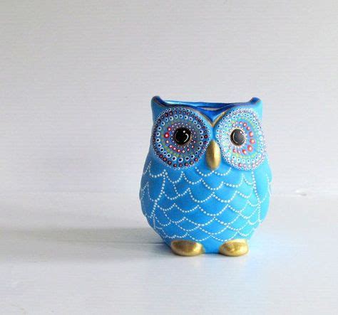 little blue round ceramic owl