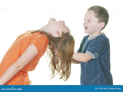 little boy and girl fighting