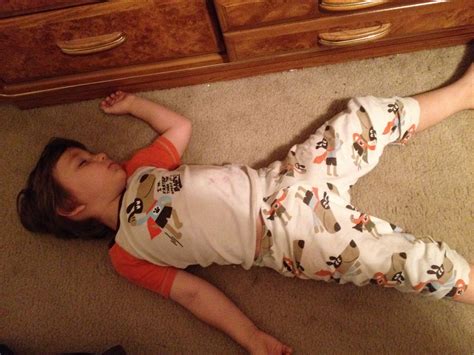 little boy passed out on kitchen floor