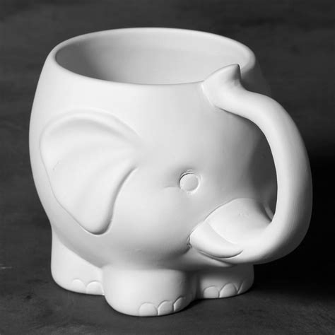 little ceramic cup with purple elephant