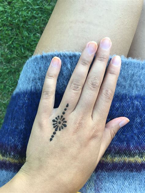 cute small ying yang sun henna tattoo Henna tattoo