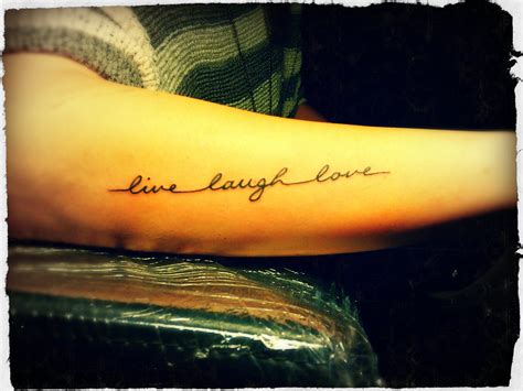 Revolutionary Live Laugh Love Tattoo Designs On Arm References