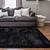 living room with black carpet
