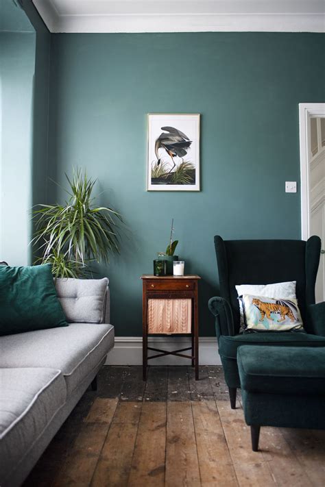 An earthy, eclectic sage green living room miranda schroeder