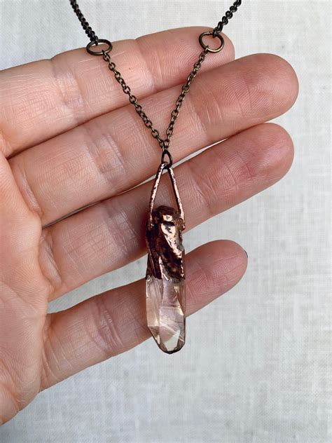 home.furnitureanddecorny.com:long crystal pendant necklace