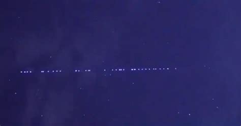 Long String Of Lights In The Sky