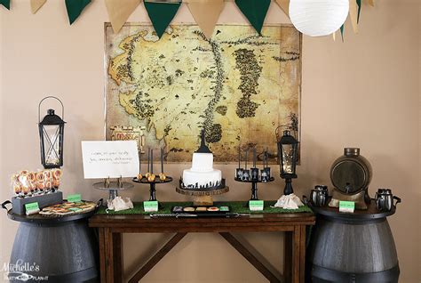 Lord of the rings party table with ring favors and Lembas bread Party rings, Dinner decoration