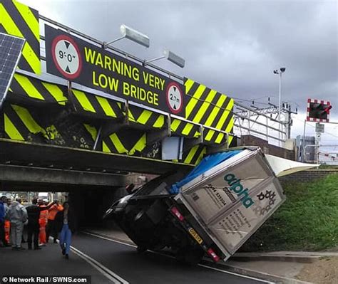 lorry hitting a bridge