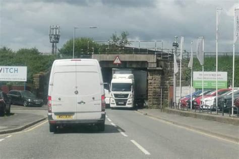 lorry stuck under bridge