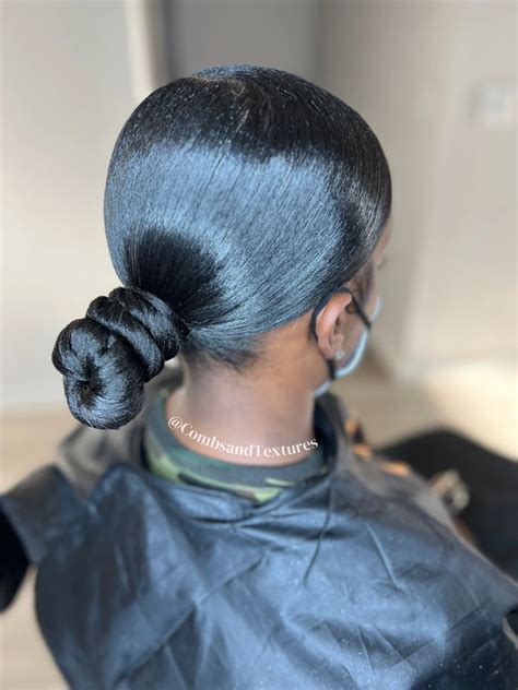 Low Knot Bun With Braiding Hair